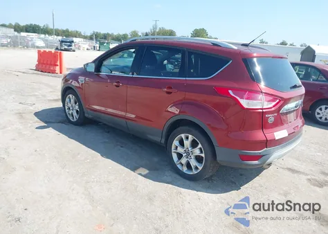 2015 Ford Escape Titanium z USA, uszkodzony, nr VIN 1FMCU9J98FUC14539